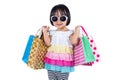 Happy Asian Chinese Little Girl Holding Shopping Bags Royalty Free Stock Photo