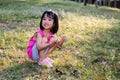 Happy Asian Chinese Little Girl Picking Wild Flowers Royalty Free Stock Photo