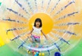 Happy Asian Chinese Little Girl Playing Roller Wheel Royalty Free Stock Photo