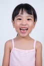 Happy Asian Chinese little girl with toothless smile Royalty Free Stock Photo