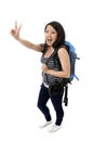 Happy asian chinese tourist woman with backpack