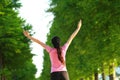 Happy Asian Chinese woman embrace nature and sun Royalty Free Stock Photo