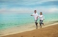 Happy asian couple at beach Royalty Free Stock Photo