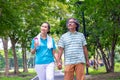 They are happy Asian couple.They give a big hug together after Jogging in park. Royalty Free Stock Photo