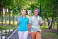 They are happy Asian couple.They give a big hug together after Jogging in park. Royalty Free Stock Photo