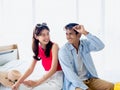 Happy Asian couple in summer, young man and woman wearing sunglasses with smile. Royalty Free Stock Photo