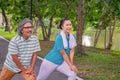 They are happy Asian couple.They  are warm up for exercise in park. Royalty Free Stock Photo