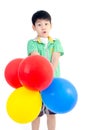 Happy asian cute boy with colorful balloons Royalty Free Stock Photo