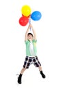 Happy asian cute boy with colorful balloons Royalty Free Stock Photo