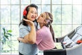 Happy Asian daughter and elderly mother in sportswear exercise together at home both of them smiled happily. Retired woman enjoy Royalty Free Stock Photo