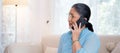 Happy asian elderly woman sitting on sofa with cozy talking with smartphone in living room at home. Royalty Free Stock Photo