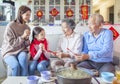 Happy asian family celebrating chinese new year at home