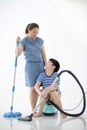 Happy asian family cleans the room. Royalty Free Stock Photo