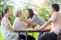 Happy asian family,father,mother with funny child girl play,laugh and hugging grandmother having fun together,smiling senior woman Royalty Free Stock Photo