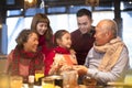 Asian family having dinner and celebrating chinese new year Royalty Free Stock Photo