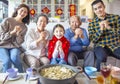 Happy asian family having dinner and celebrating chinese new year at home