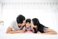 Happy asian family people leisure in bedroom together