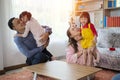 Happy Asian family playing together at sofa Royalty Free Stock Photo