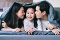 Happy asian family portrait with mother, father and daughter Royalty Free Stock Photo