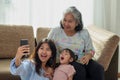 Happy Asian family selfie in their house, love and happiness people concept Royalty Free Stock Photo