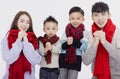 Happy asian family showing congratulation gesture for celebrating Chinese new year Royalty Free Stock Photo