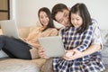 Happy asian family spending time together on sofa in living room. family and home concept Royalty Free Stock Photo