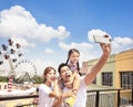 Happy family taking selfie in the park Royalty Free Stock Photo