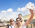 Happy family taking selfie in the park Royalty Free Stock Photo