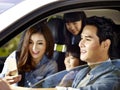 Happy asian family traveling by car Royalty Free Stock Photo