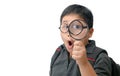 Happy asian fat boy holding magnifying glass. Royalty Free Stock Photo
