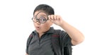 Happy asian fat boy holding magnifying glass. Royalty Free Stock Photo