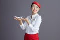 happy asian female flight attendant looking at copy space Royalty Free Stock Photo