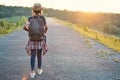 Happy Asian girl backpack on the road Royalty Free Stock Photo