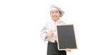 Happy asian girl chef in uniform holding blank blackboard isolated on white Royalty Free Stock Photo