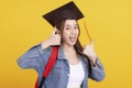 Happy Asian girl college student in Graduation cap  with thumbs up  gesture Royalty Free Stock Photo