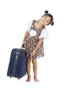 Happy Asian girl with heavy luggage Royalty Free Stock Photo