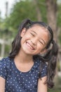 Happy Asian girl kid showing front teeth with big smile Royalty Free Stock Photo