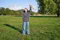 Happy asian girl, musician with ukulele, feeling carefree, enjoying freedom and fresh air outdoors, playing musical Royalty Free Stock Photo