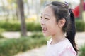 Happy Asian girl at playground outdoor. Royalty Free Stock Photo