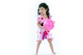 Happy asian girl playing ball