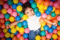 Happy asian girl playing in colorful balls pool Royalty Free Stock Photo