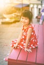 Happy asian girl smiling and relaxing outdoors in the day time, Royalty Free Stock Photo