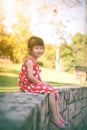 Happy asian girl smiling and relaxing outdoors in the day time, Royalty Free Stock Photo