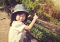 Happy asian girl smiling and relaxing outdoors in the daytime, t Royalty Free Stock Photo