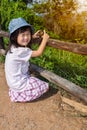 Happy asian girl smiling and relaxing outdoors in the daytime, t Royalty Free Stock Photo