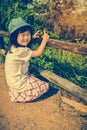 Happy asian girl smiling and relaxing outdoors in the daytime, t Royalty Free Stock Photo