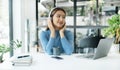 Happy Asian girl wearing headphones listening to music enjoying on smartphone digital. relaxation concepts Royalty Free Stock Photo