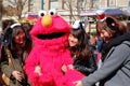 Appy asian girls take shot with Sesame Street Elmo in Universal Studios Japan USJ, Osaka, Japan