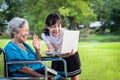 Happy asian granddaughter enjoy smiling and senior grandmother using video conferencing with laptop computer,child girl having Royalty Free Stock Photo