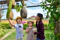 Happy Asian kids eating popcorn Royalty Free Stock Photo